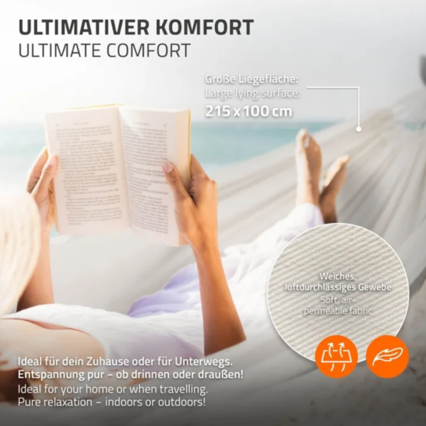 Femme lisant un livre dans un hamac sur pied avec une large surface de couchage de 215x100 cm.